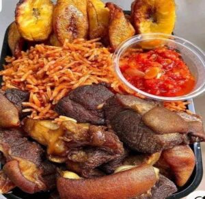 Goat meat jollof rice and plantain